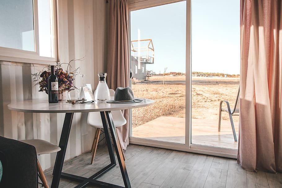 indoors, vacation, table, evening, wine, glasses, view, boutique hotel, hotel room, scandinavian