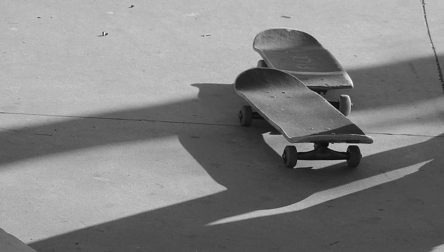 skateboard, street, radical, outdoors, chair, shadow, sunlight, nature, day, high angle view