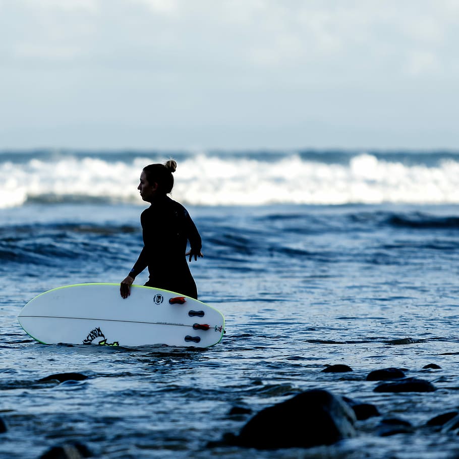 woman carrying surfboard, woman, surfboard, sea, surfing, sport, wave, outdoors, water Sport, water