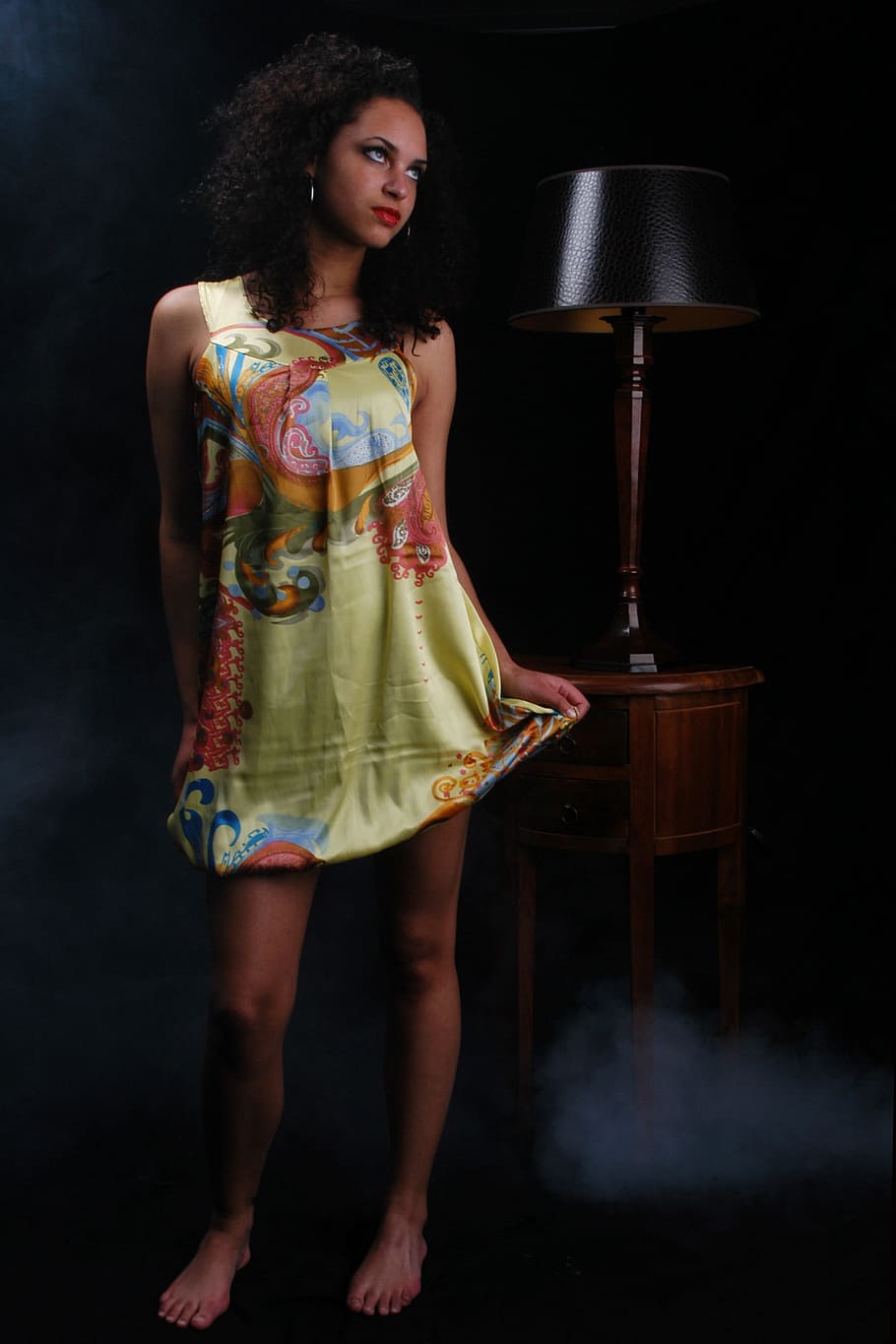 woman, wearing, green, red, blue, mini dress, table, lamp, young woman, beauty