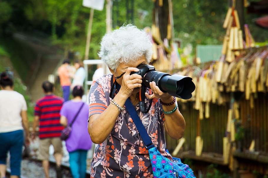 woman, taking, using, dslr camera, grandma, sony, dslr, camera, 70, elderly