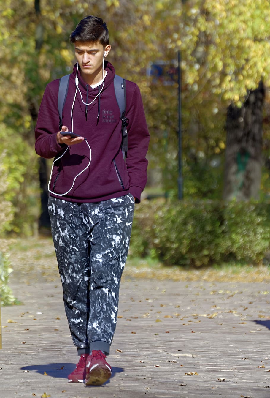 boy, young, person, adult, going, alley, park, listening to the, headphones, ear