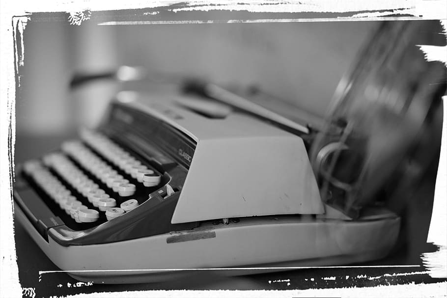 grayscale photography, typewriter, words, old, retro, writing, typing, close-up, indoors, technology