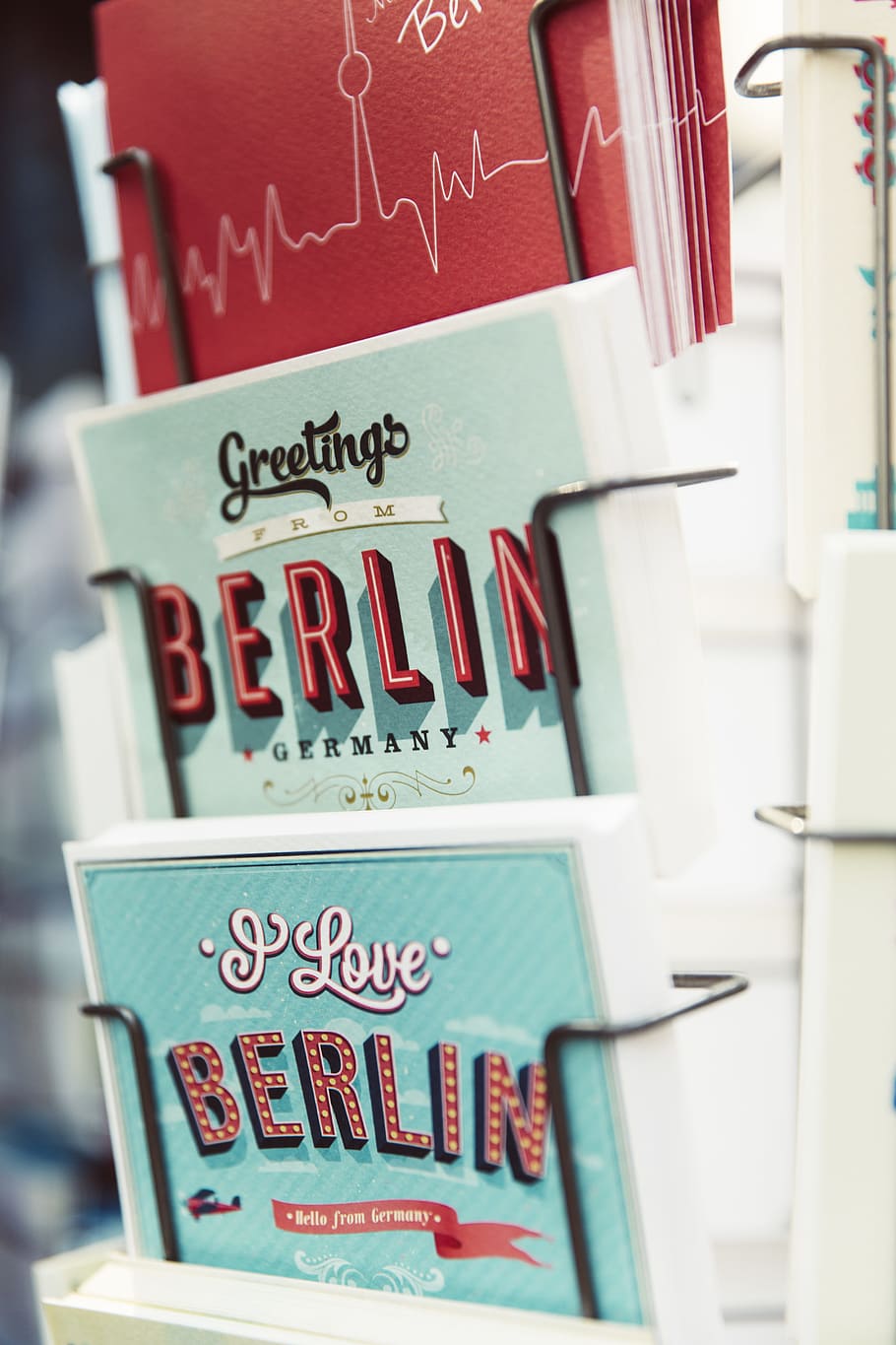 close-up photo, books, arranged, rack, architecture, berlin, bridge, building, capital, german