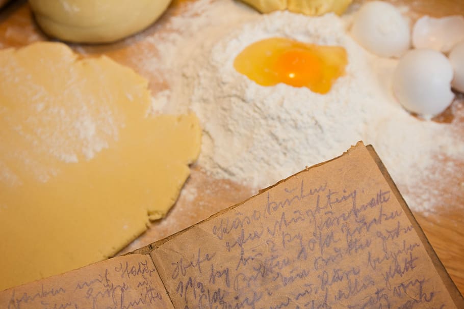 flour, egg, desk, floor, recipe book, table, cheek, old, handwriting, bake
