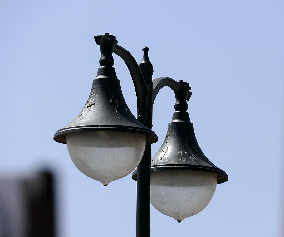 street, lamp, sky, light, energy, lantern, object, town, low angle view, day
