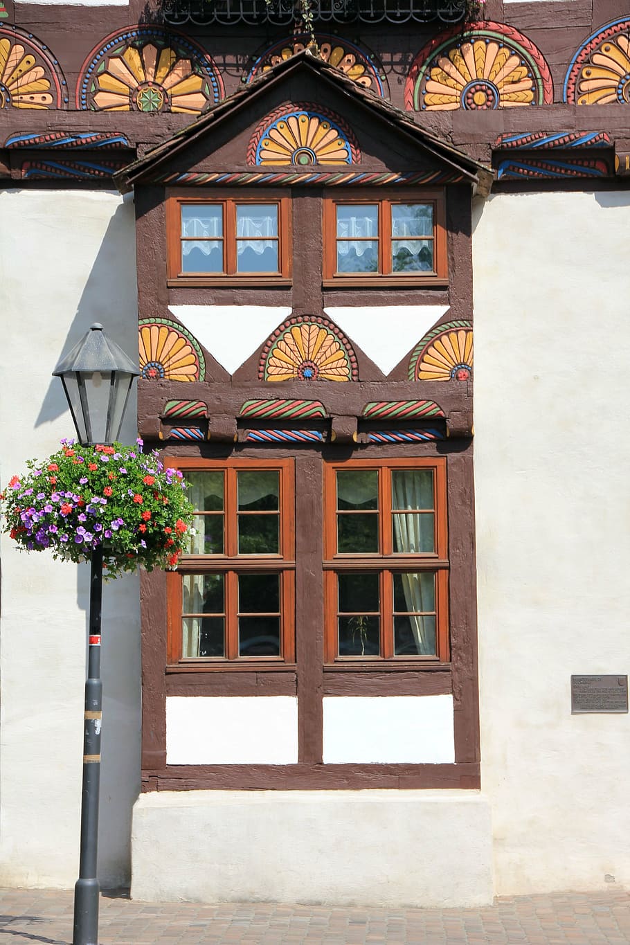 building, truss, fachwerkhaus, home, window, bay window, lantern, flowers, geranium, carving