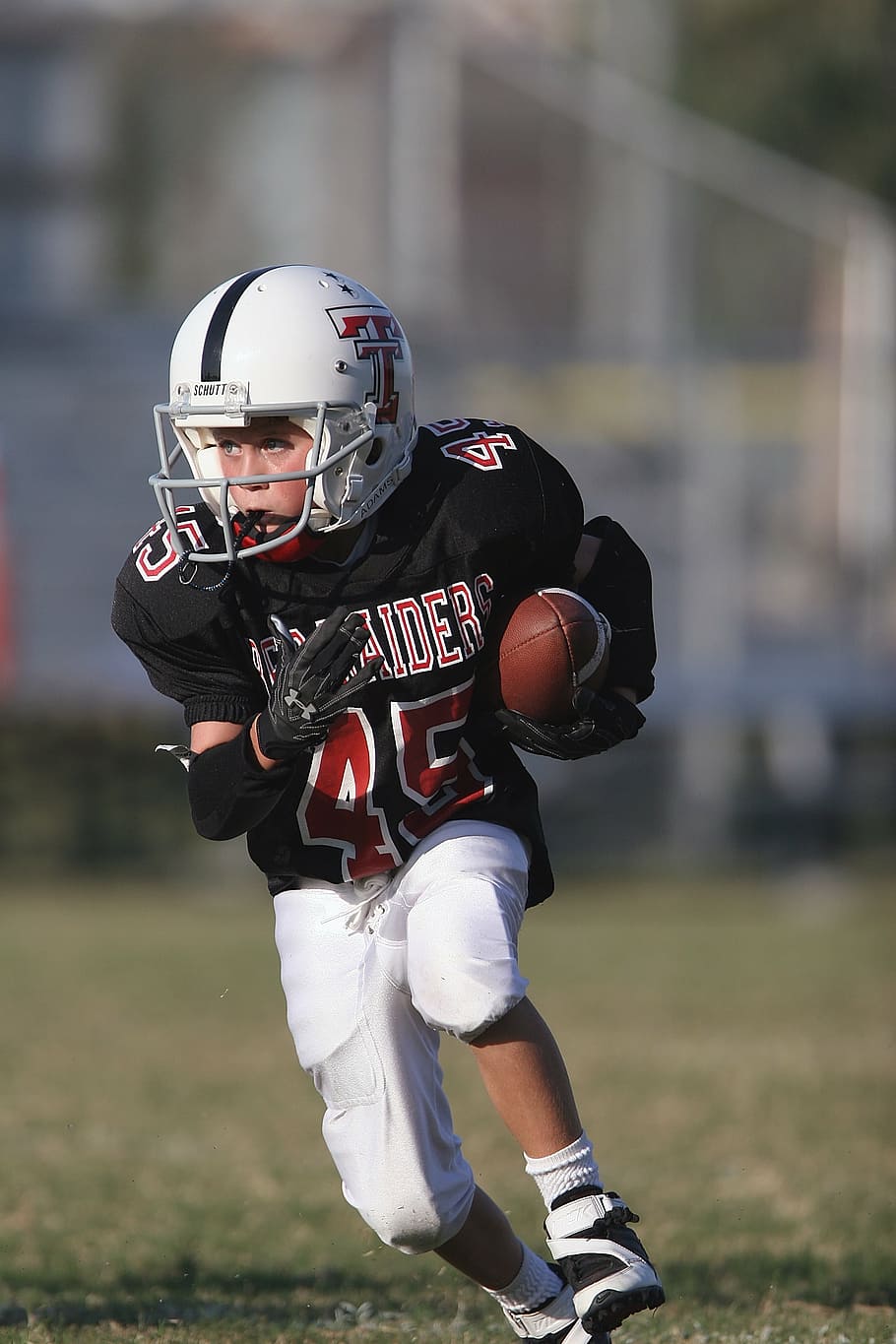 boy, holding, football, running, daytime, running back, action, youth league, ball, sport