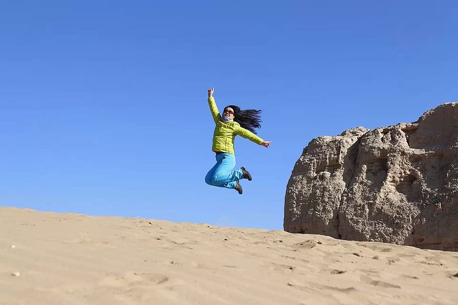 blue sky, desert, leap, jump, jumping, woman, one person, mid-air, sky, blue