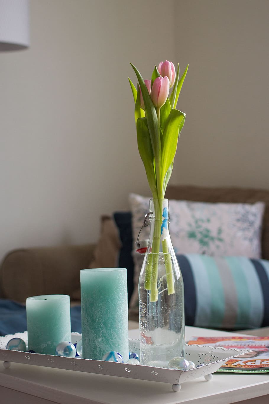 pink, tulips, clear, glass vase, two, teal pillar candles, flower, glass, vase, living room