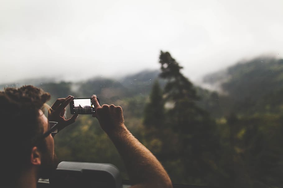 sky, mountain, camera, phone, people, man, photography, trees, blur, technology
