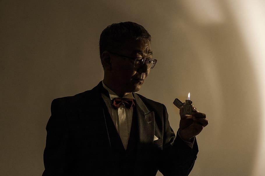 magic tricks, magician, japan, magic, one person, well-dressed, formalwear, adult, smoking - activity, indoors