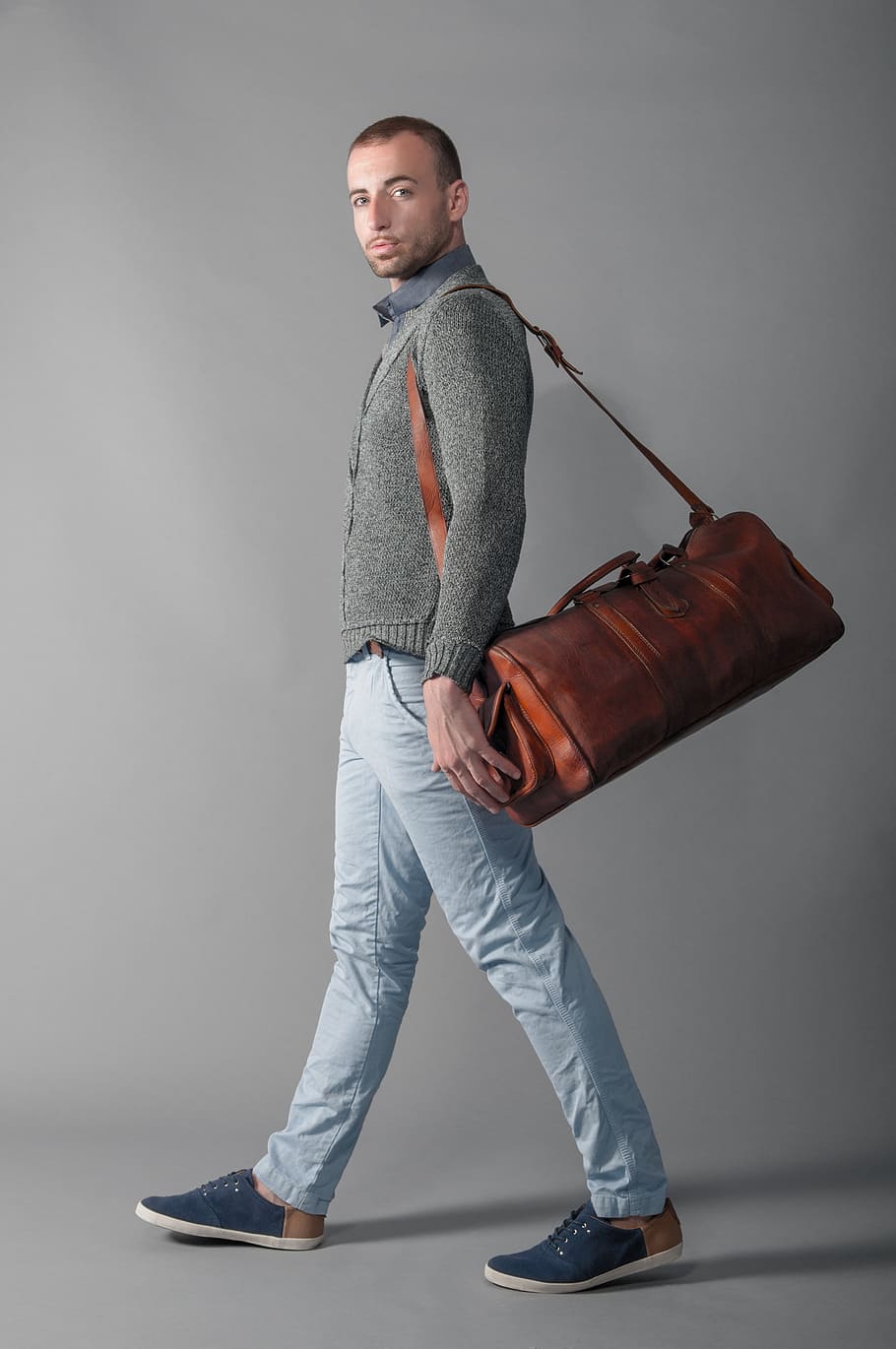 man, wearing, brown, leather duffel bag, fashion, shooting, guy, male, person, leather