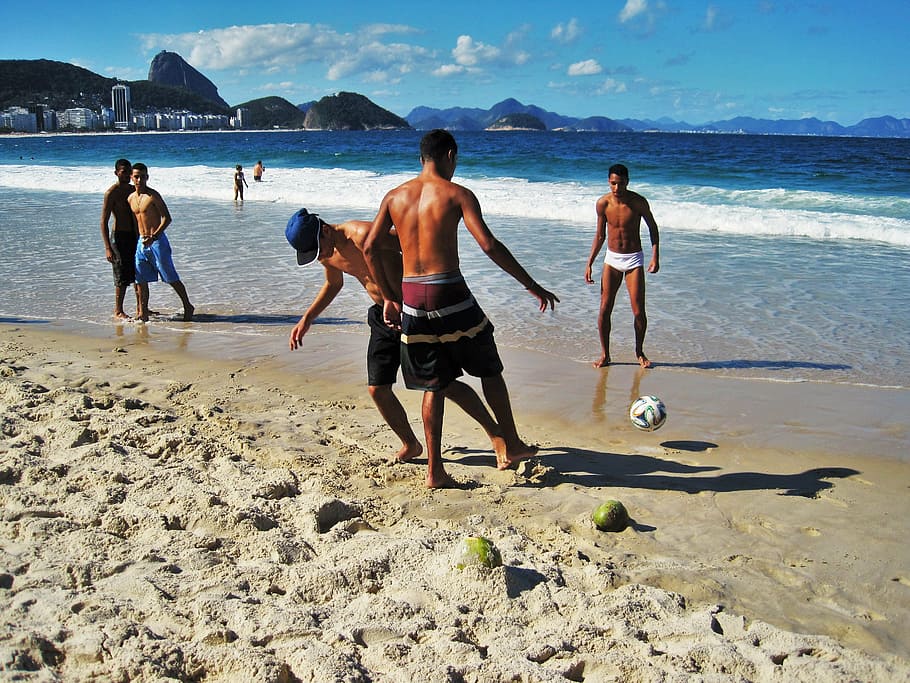 man, playing, beach volleyball, brazilian, football, copacabana, rio, at the copacabana, view of sugar loaf mountain, beach