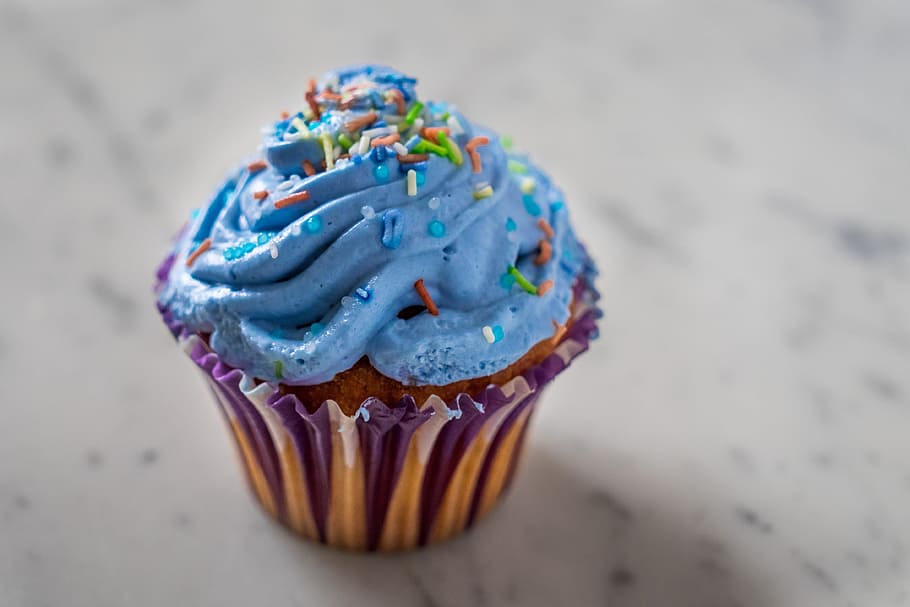 blue filled cupcake, cupcake, sweet, pastry, muffin, icing, sprinkles, sugar, food, sweet food
