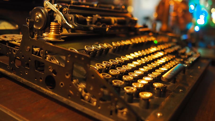 typewriter, steampunk, model, technology, machinery, indoors, selective focus, equipment, metal, control