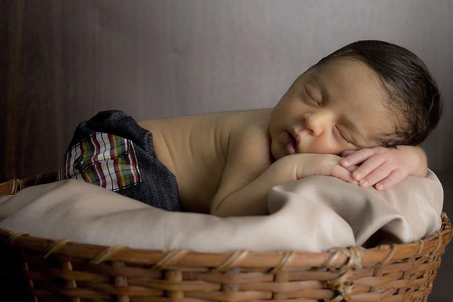 baby, sleeping, gray, bed, inside, room, basket, hand, mouth, eyes