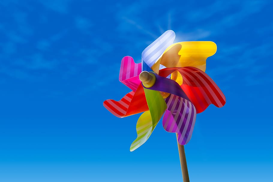 pinwheel, sky, clouds, sun, wind, blue, toys, windmill, beauty in nature, flowering plant