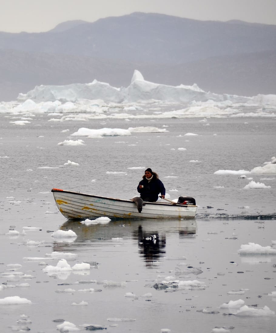 inuit, robben hunter, icefjord, greenland, water, mountain, real people, transportation, beauty in nature, waterfront