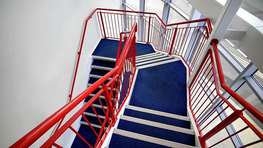 red steel railings, stairs, stairwell, stairway, staircase, construction, modern, design, architecture, interior