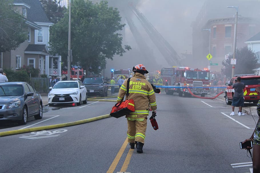 fireman, carrying, duffle bag, walking, road, surrounded, cars, Fire, Boston, Building, Emergency