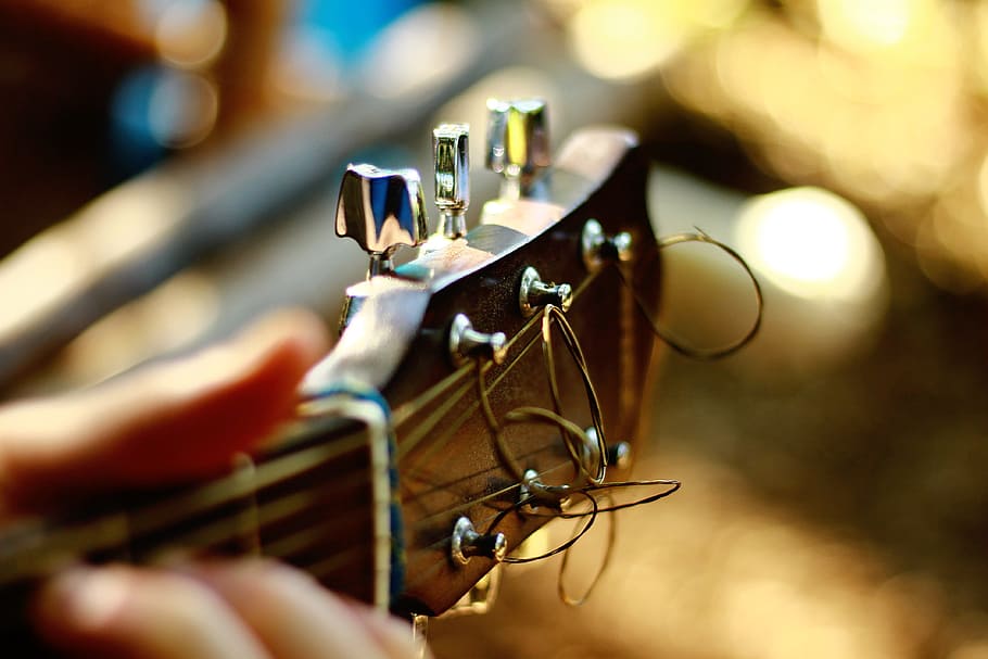 person, holding, acoustic, guitar, acoustic guitar, blur, blurry, bokeh, capstan, chrome
