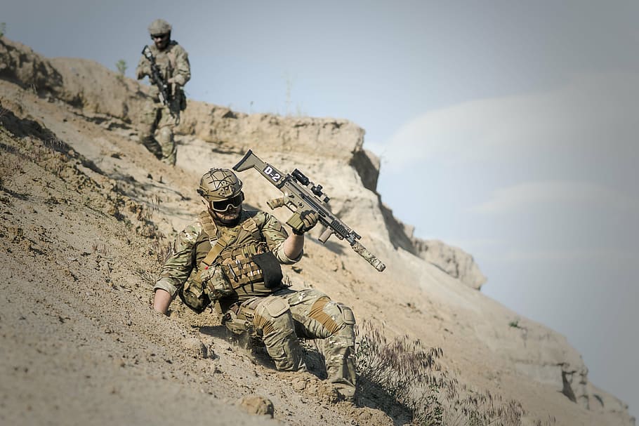 soldier, realistic, camouflage suit, holding, assault rifle, sliding, downhill, war, desert, guns