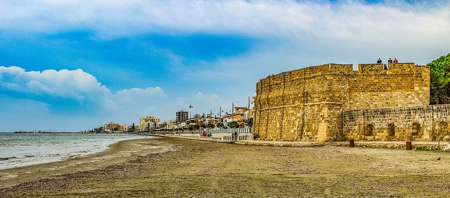 seashore during daytime, cyprus, larnaca, fortress, castle, beach, seaside, travel, fort, architecture