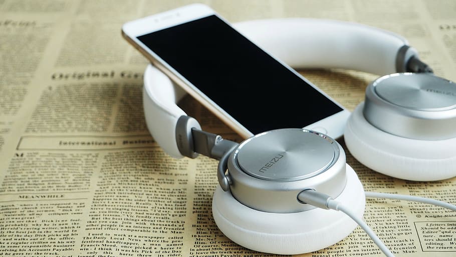 shallow, focus photography, gold iphone 6, white, wired, on-ear headphones, yellow, newspaper, headphones, headset