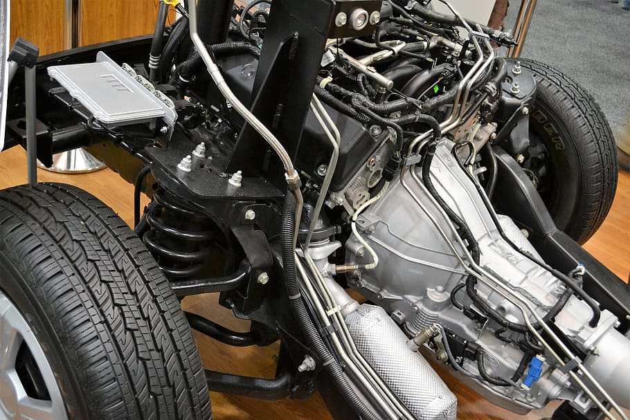 black, gray, vehicle chassis, car engine, motor, wires, suspension, electronic, tires, frame
