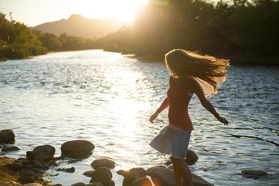 people, woman, sunset, happy, alone, river, lake, rocks, sun, hair