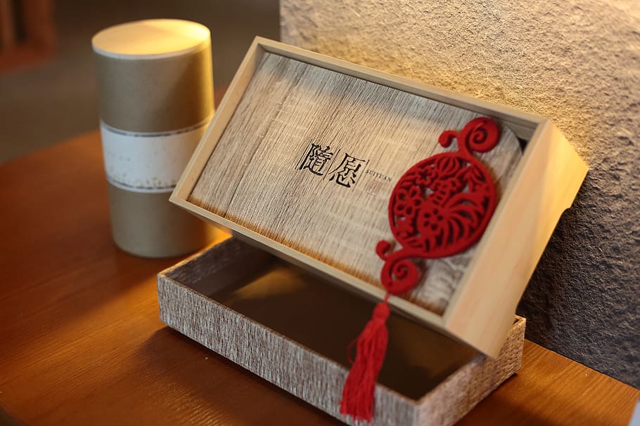 tea box, with the wish to, chinese knot, table, still life, food and drink, wood - material, high angle view, communication, indoors