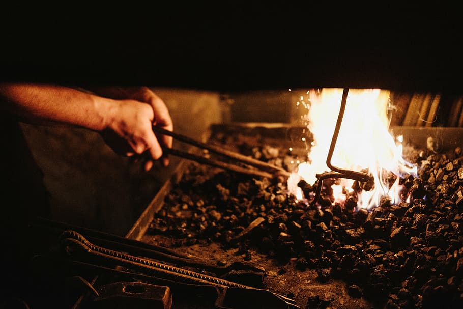 person doing bonfire, fire, people, man, smith, blacksmith, heat, smoke, ash, charcoal