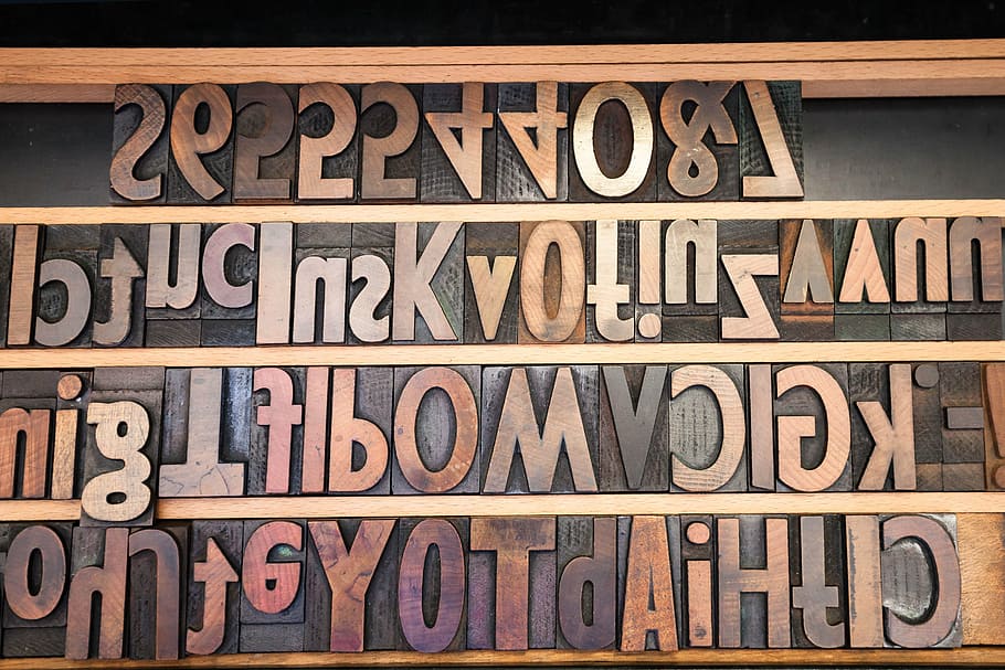 brown, wooden, freestanding letters, letters, wooden alphabet letters, sans serif, book printing, mechanical process, font, johannes gutenberg