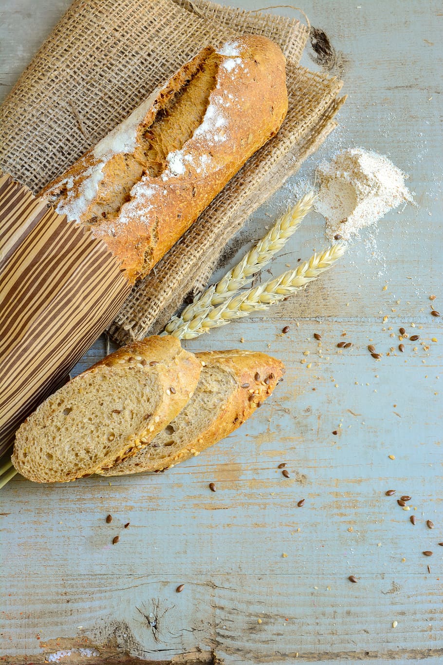 sliced, french, bread, table, artisan, food, paper, rustic, whole wheat, warm