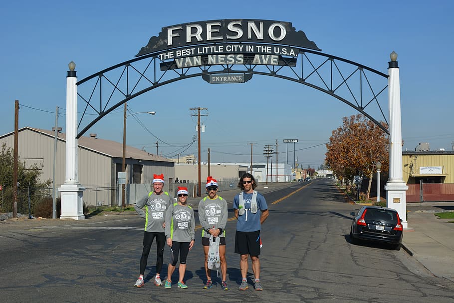 fresno, running, christmas, full length, architecture, front view, day, sky, text, real people
