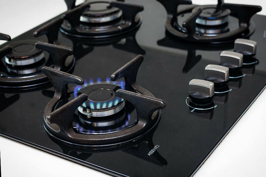 black, 4-burner, 4- burner stove, top, gas stove, gas, orange, kitchen, inside, dishwasher