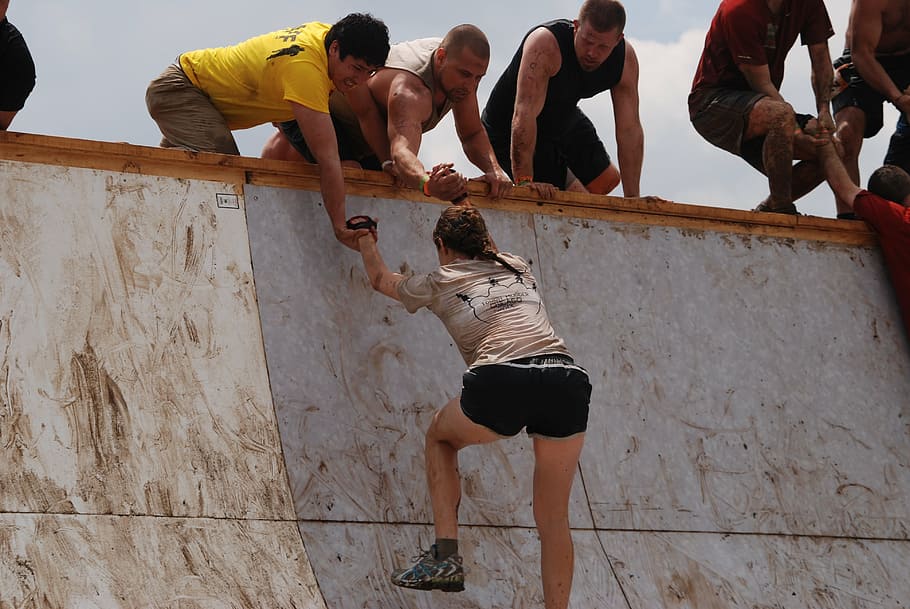 woman, climbing, wall, two, man, helping, girl, mud, run, slope