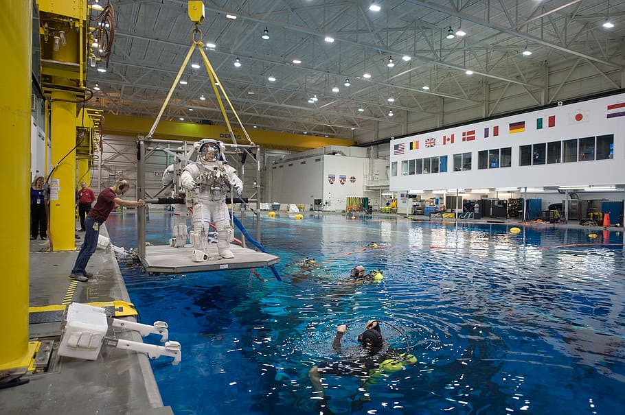 astronaut, spacesuit, weightlessness, training, water, pool, helmet, space station, science, exploration