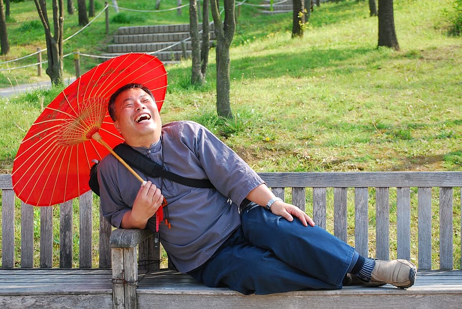 man, laughing, sitting, bench, holding, oil paper umbrella, men who, japanese, laughter, umbrella