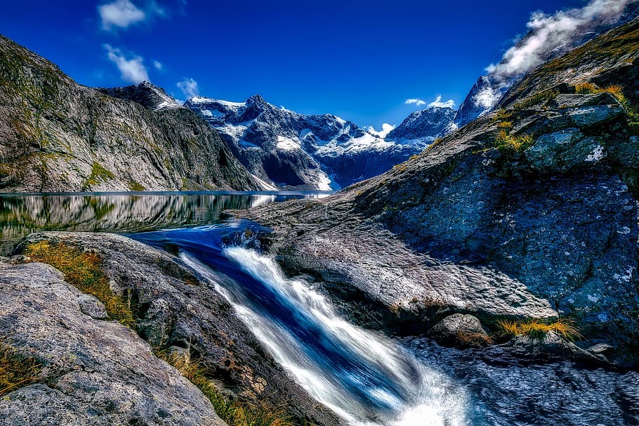 landscape photography, waterfalls, fiordland national park, new zealand, landscape, scenic, mountains, snow, lake, water