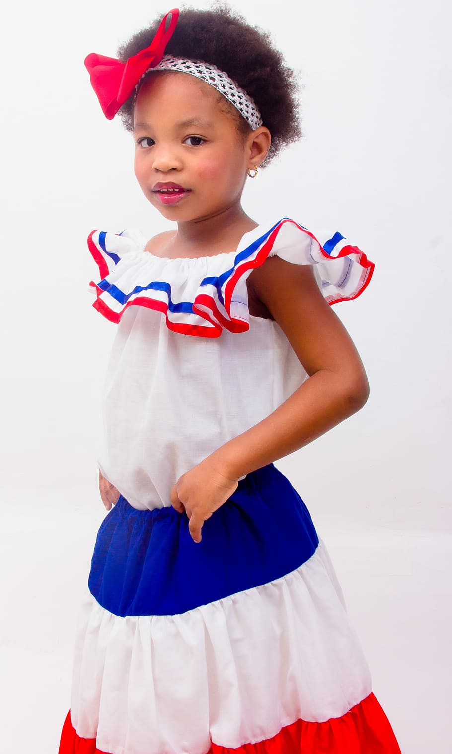 Dominican, Girl, Dress, dominican republic, colors, red with blue, blue with red, smiling, happy, child