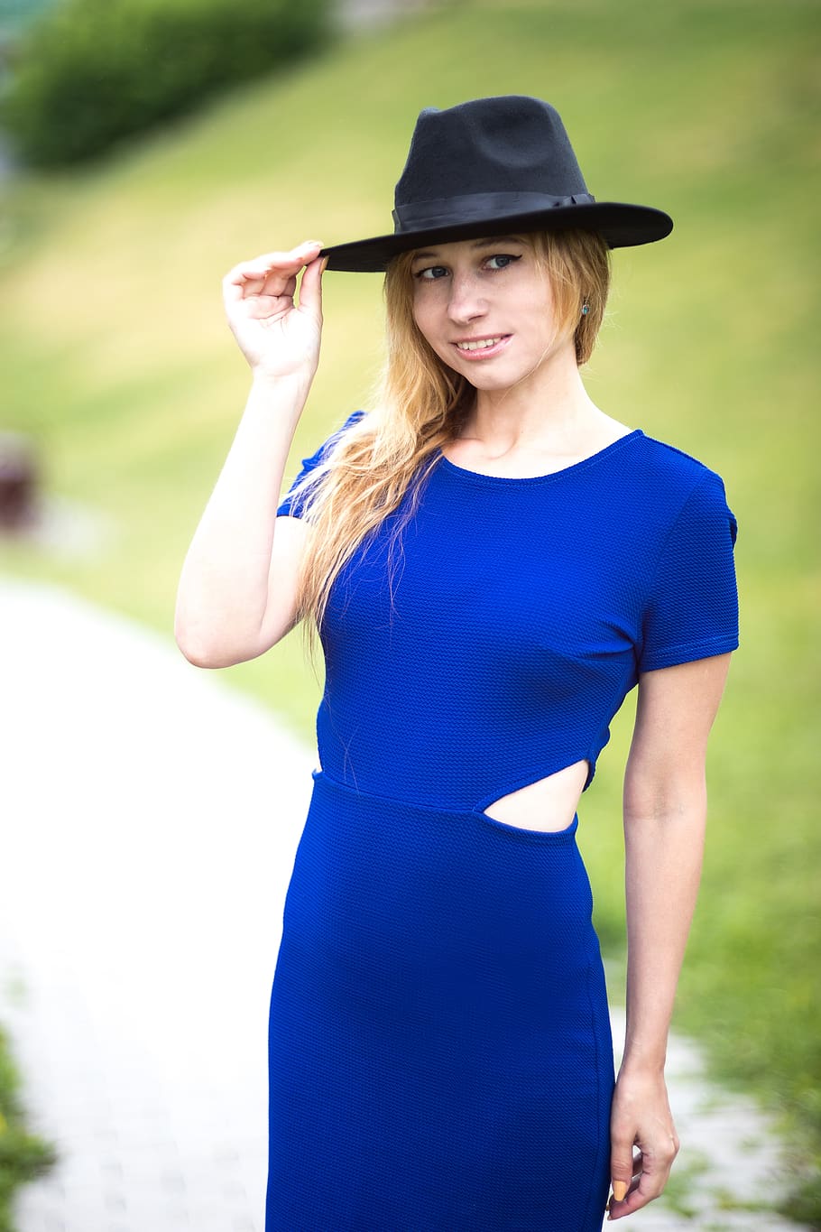 greeting, hat, the gesture, blue dress, indigo, fashion, the neckline of the dress, tight, fitted dress, smile