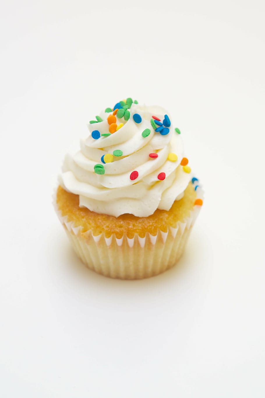 cupcake with icing, cupcake, dessert, sprinkles, pastry, delicious, sugar, icing, white, bakery