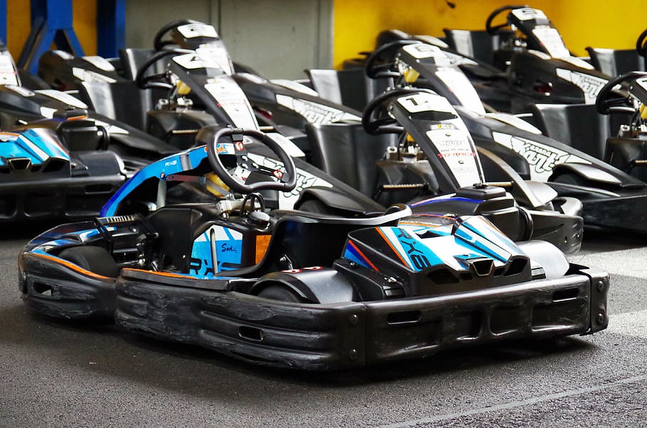 go karts, race, ride, technology, indoors, large group of objects, transportation, machinery, close-up, choice