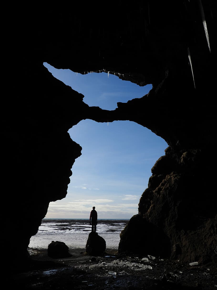 silhouette, man, standing, rock, body, water, cave, lava cave, hjörleifshöfði, hjörleifshöfði cave