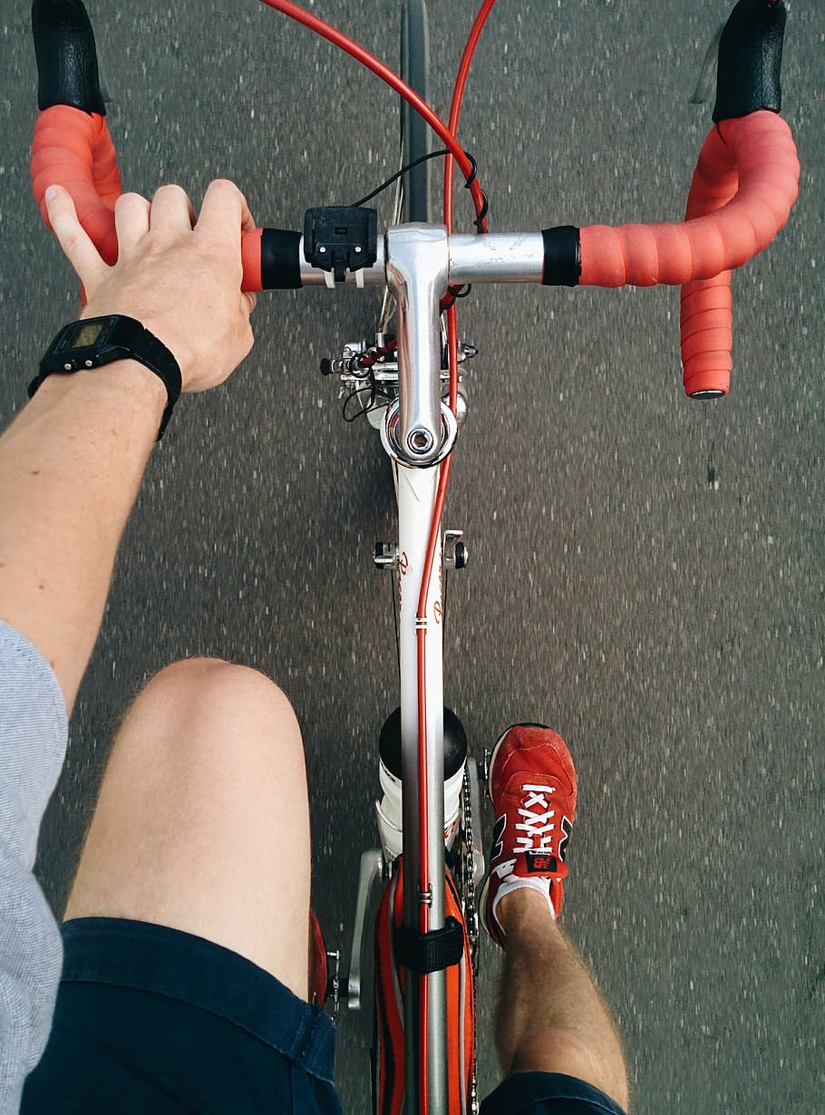 person, wearing, red, new, balance shoes, riding, road bicycle, bicycle, bike, ride