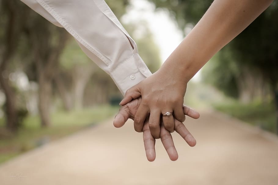 person interlocking hands, couple, man, woman, girl, guy, bokeh, trees, love, people