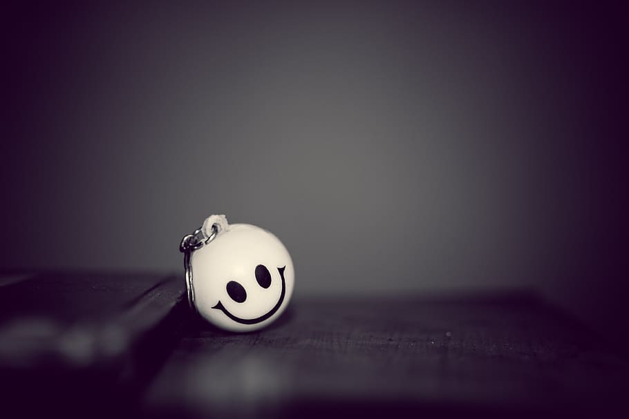 smiley emoji, key, chain, Key Chain, Smiley, Clown, black, indoors, shadow, arts culture and entertainment