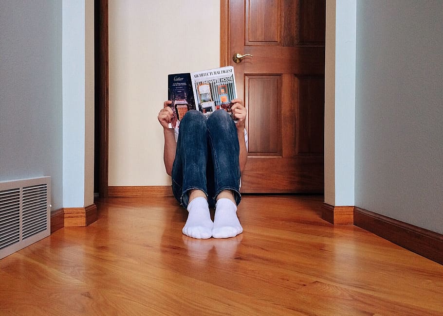 Person, Reading, Magazine, Home, young, hardwood floor, indoors, one person, rear view, people